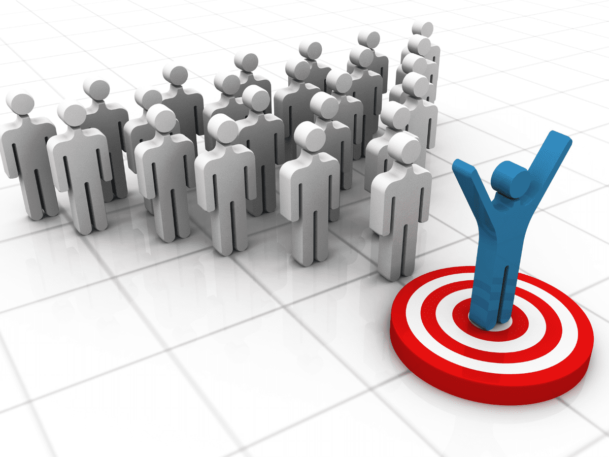 Blue figure achieving target before gathered crowd.