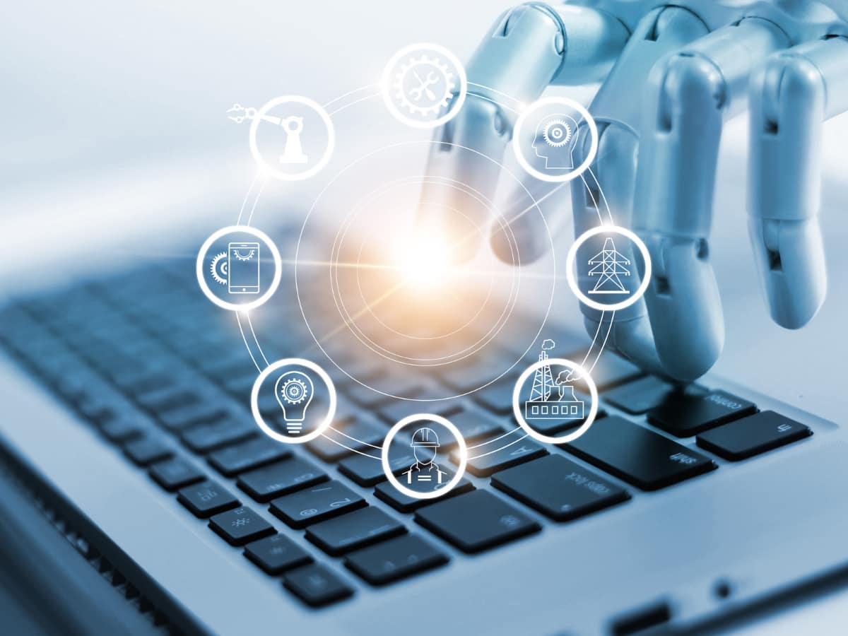 Robotic hand interacting with technology